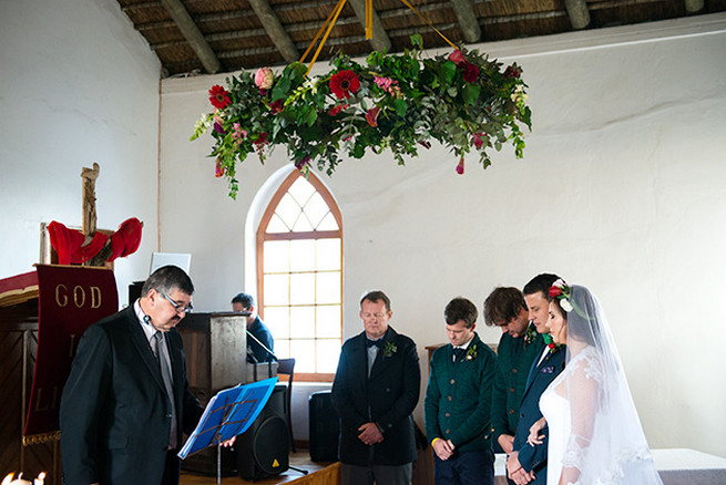 Floral chandelier. Woodlands Winter Wedding in deep blue, burgundy and emerald green // Knit Together Photography