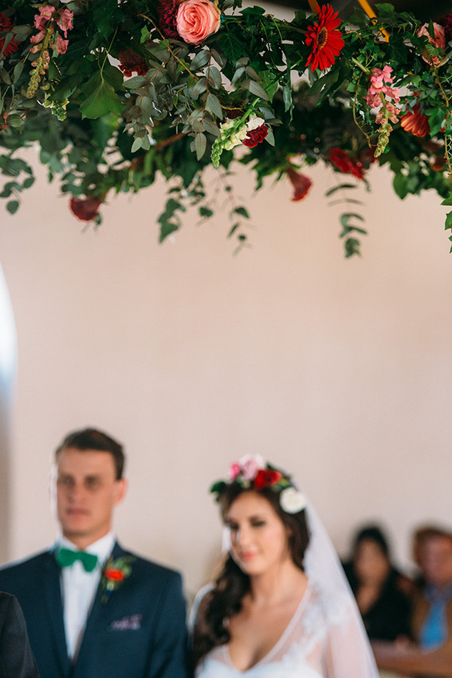 Floral chandelier. Woodlands Winter Wedding in deep blue, burgundy and emerald green // Knit Together Photography