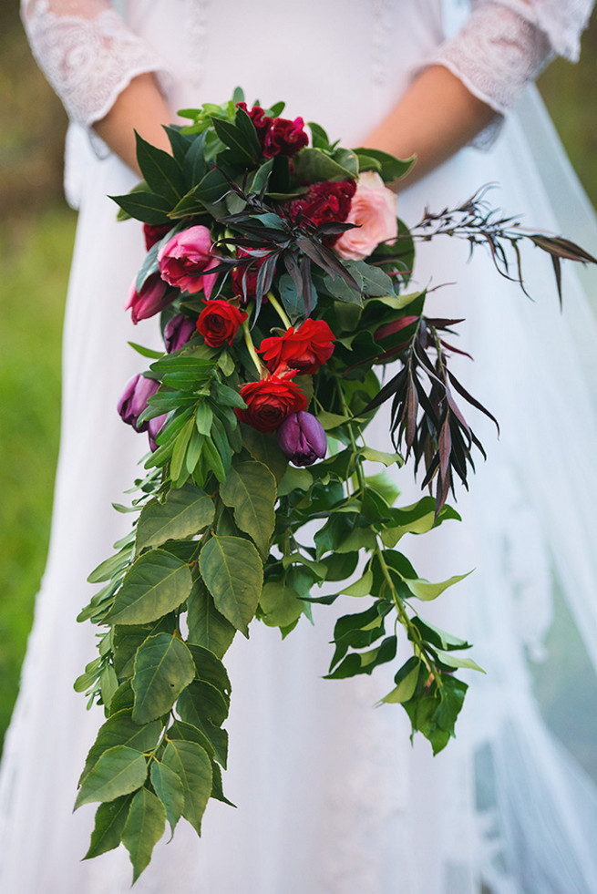 Cascading bride bouquet. Woodlands Winter Wedding in deep blue, burgundy and emerald green // Knit Together Photography