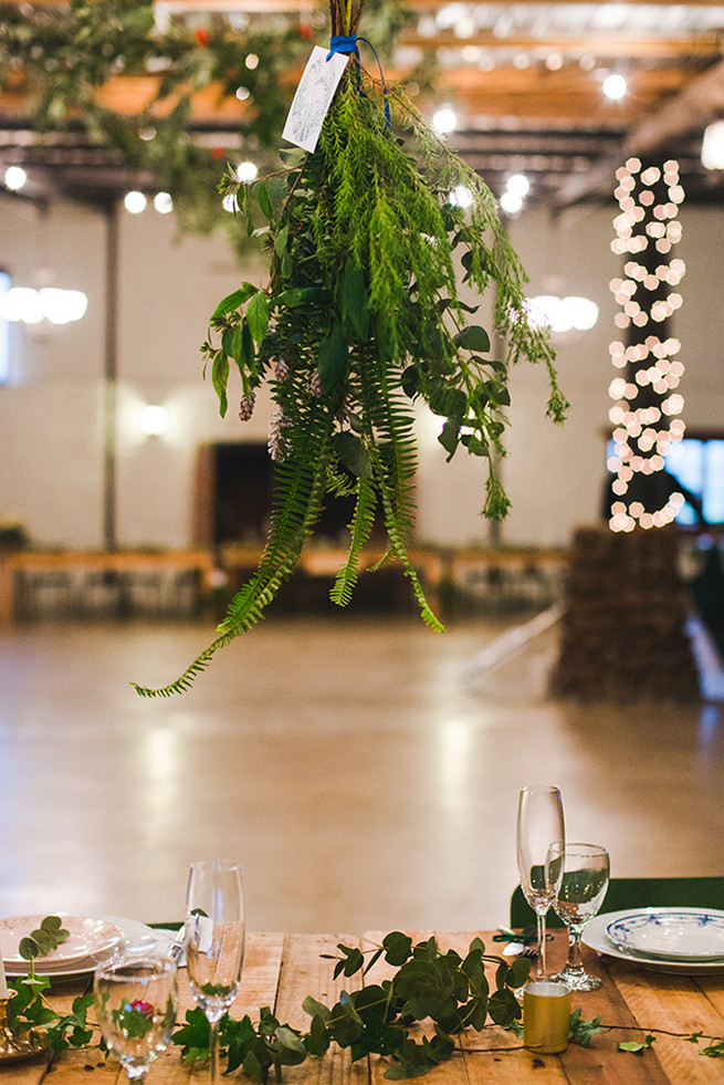 How to use natural greenery in decor bring the outdoors indoors for a woodlands Winter Wedding in deep blue, burgundy and emerald green // Knit Together Photography