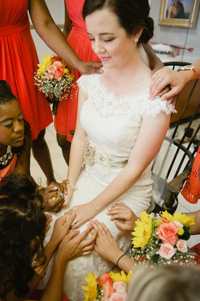 Bride praying with bridesmaids. Coral Navy Mustard Wedding / Meredith McKee Photography