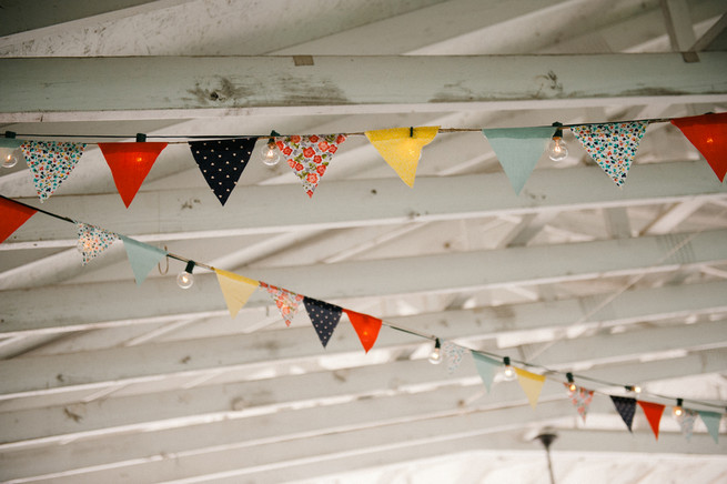 Bunting.  Coral Navy Mustard Wedding / Meredith McKee Photography