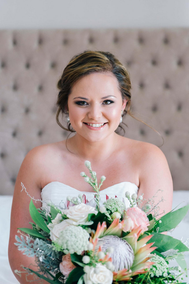 King Protea, Queen Annes Lace, Jasmine, Lambs Ear and rose wedding bouquet. 