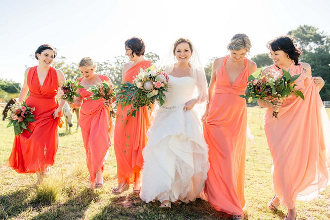 Peach coral mismatched bridesmaid dresses // Langkloof Roses Wedding, Cape Town - Claire Thomson Photography