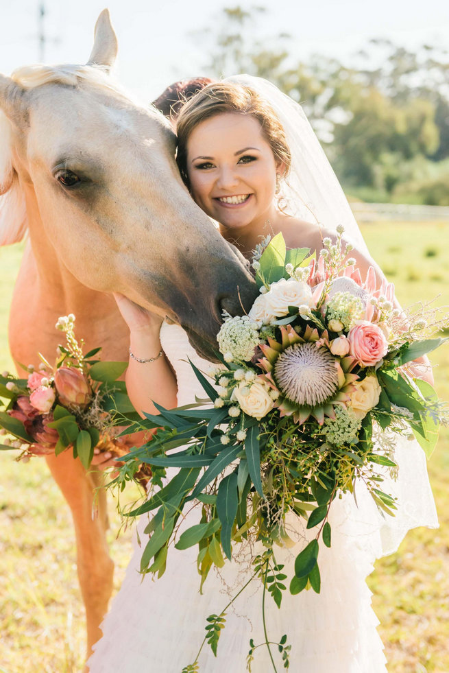 King Protea, Queen Annes Lace, Jasmine, Lambs Ear and rose wedding bouquet. 