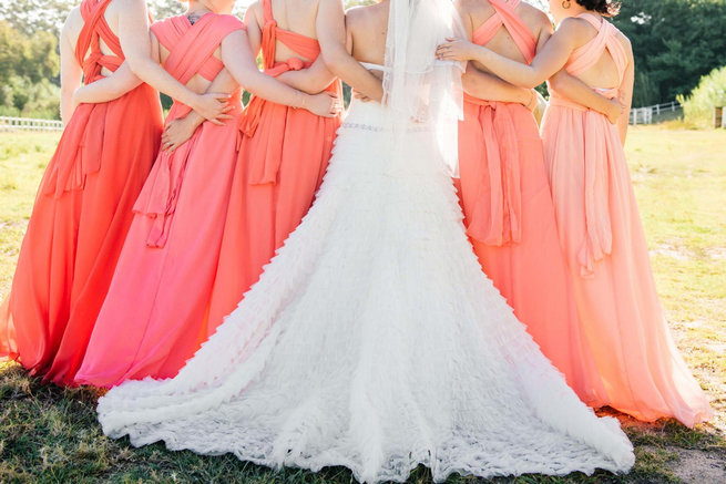 Peach coral mismatched bridesmaid dresses // Langkloof Roses Wedding, Cape Town - Claire Thomson Photography