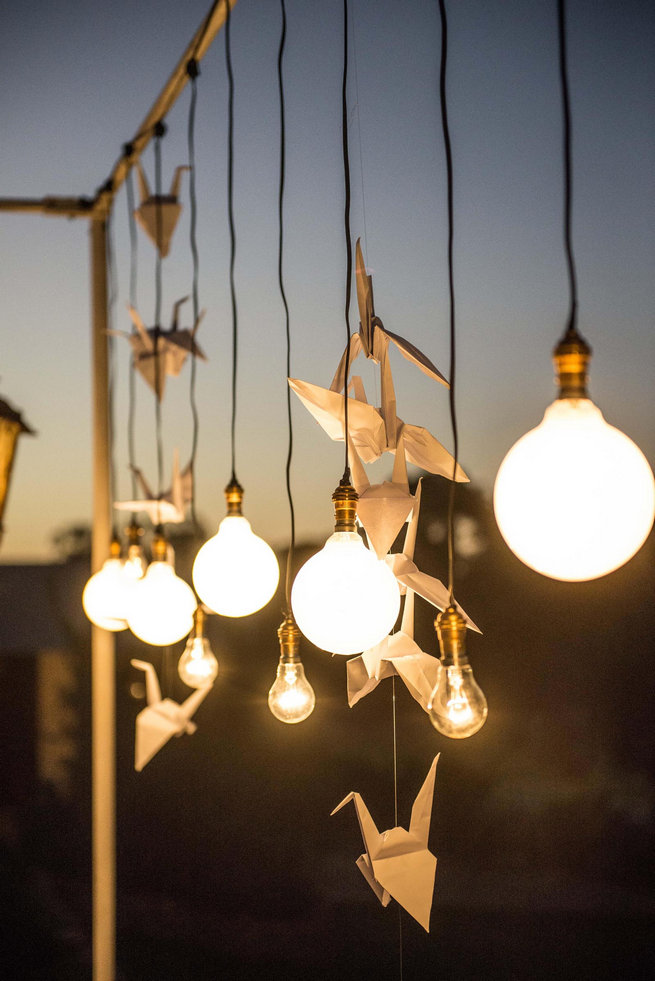 Naked bulbs on outdoor dancefloor / Langkloof Roses Wedding, Cape Town - Claire Thomson Photography