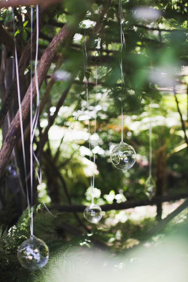 Hanging glass bubbles in forest  - Langverwagt Wedding - Justin Davis Photography