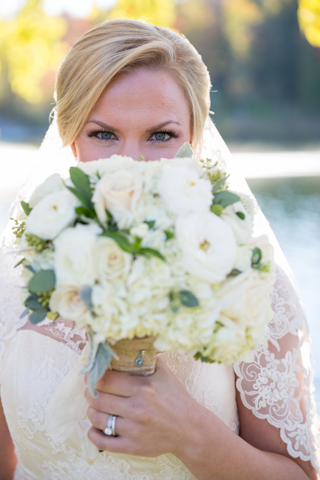 White roses, white ranunculus, white hydrangea, eucalyptus and lambs ear bouquet.  Beautiful Burgundy and Tan Wedding - Molinski Photo