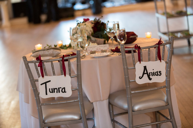 Chair signs Beautiful Burgundy and Tan Wedding - Molinski Photo