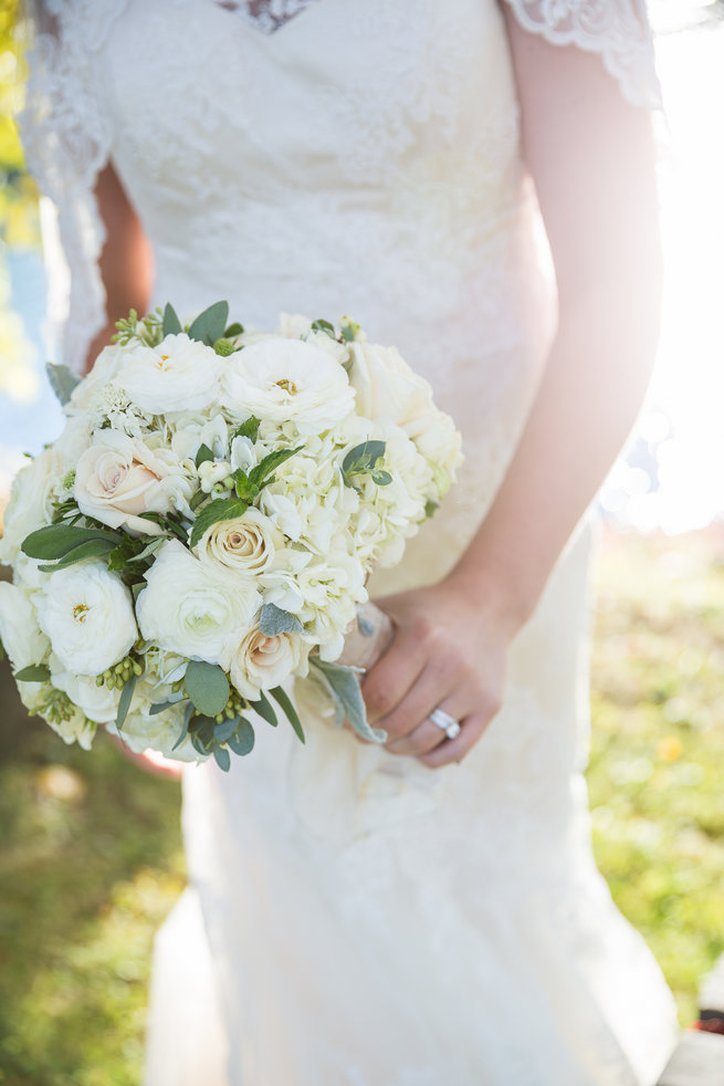 White roses, white ranunculus, white hydrangea, eucalyptus and lambs ear bouquet.  Beautiful Burgundy and Tan Wedding - Molinski Photo