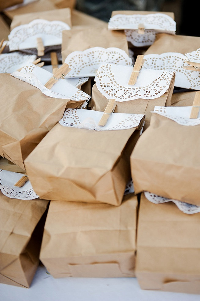 Brown paper favor bags with doily and clothes peg popcorn favors / Coral and Green South African Wedding // D'amor Photography