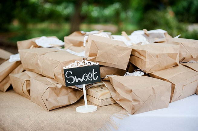 Brown paper favor bags with doily and clothes peg sweet favors / Coral and Green South African Wedding // D'amor Photography