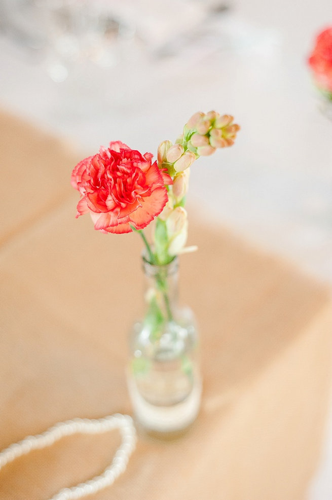 Single stem peach carnation in vintage vase / Coral and Green South African Wedding // D'amor Photography
