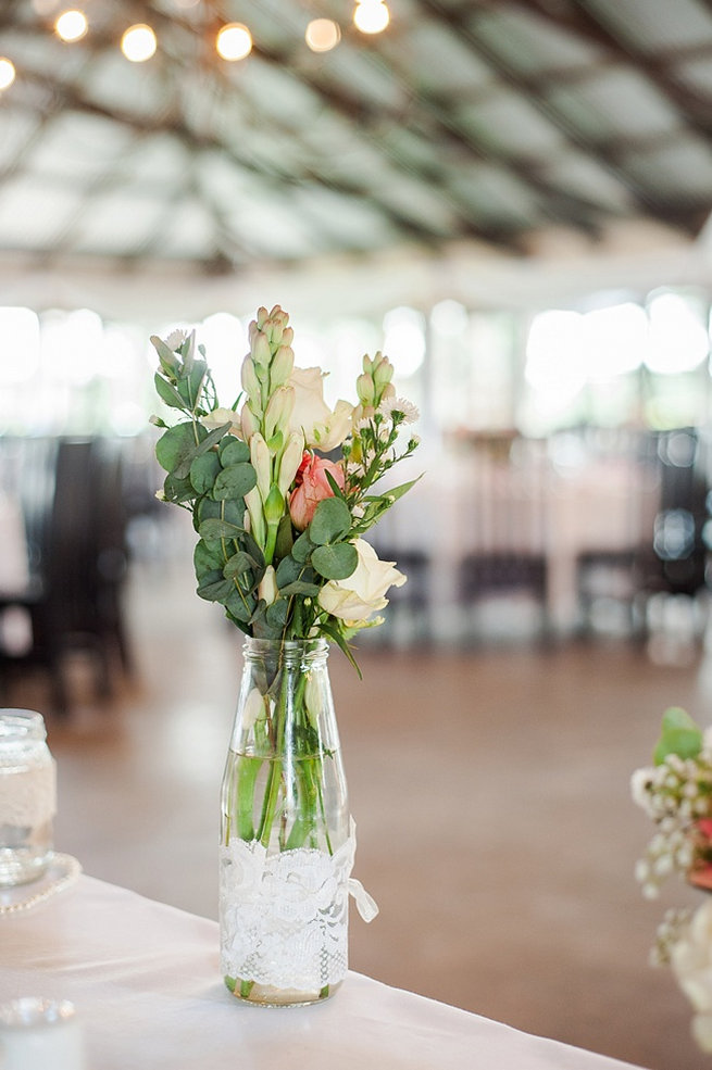 Eucalyptus and snapdragons in vase / Coral and Green South African Wedding // D'amor Photography