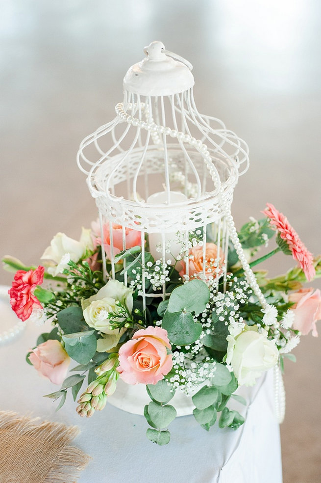 White birdcage with peach and green flowers / Coral and Green South African Wedding // D'amor Photography