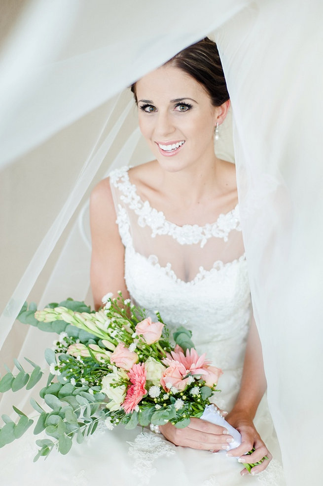 Bridal portrait under veil / Coral and Green South African Wedding // D'amor Photography