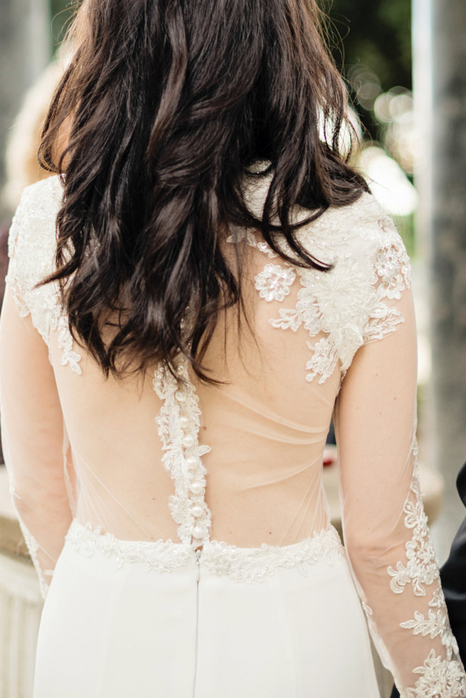 Sheer long sleeved wedding dress, backless and oh so chic . Elopement in Rome, Italy - Rochelle Cheever Photography