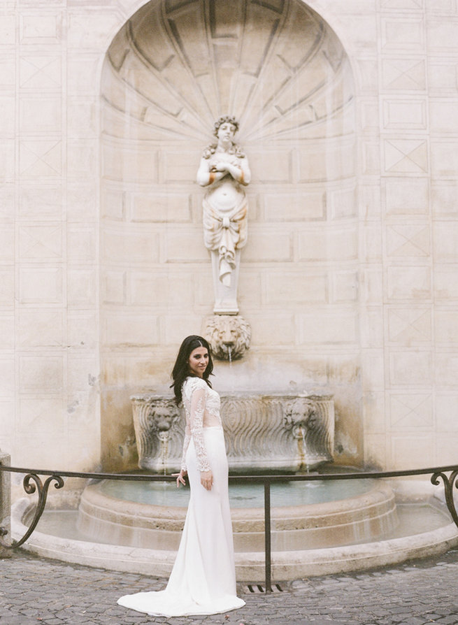 Sheer long sleeved wedding dress, backless and oh so chic . Elopement in Rome, Italy - Rochelle Cheever Photography