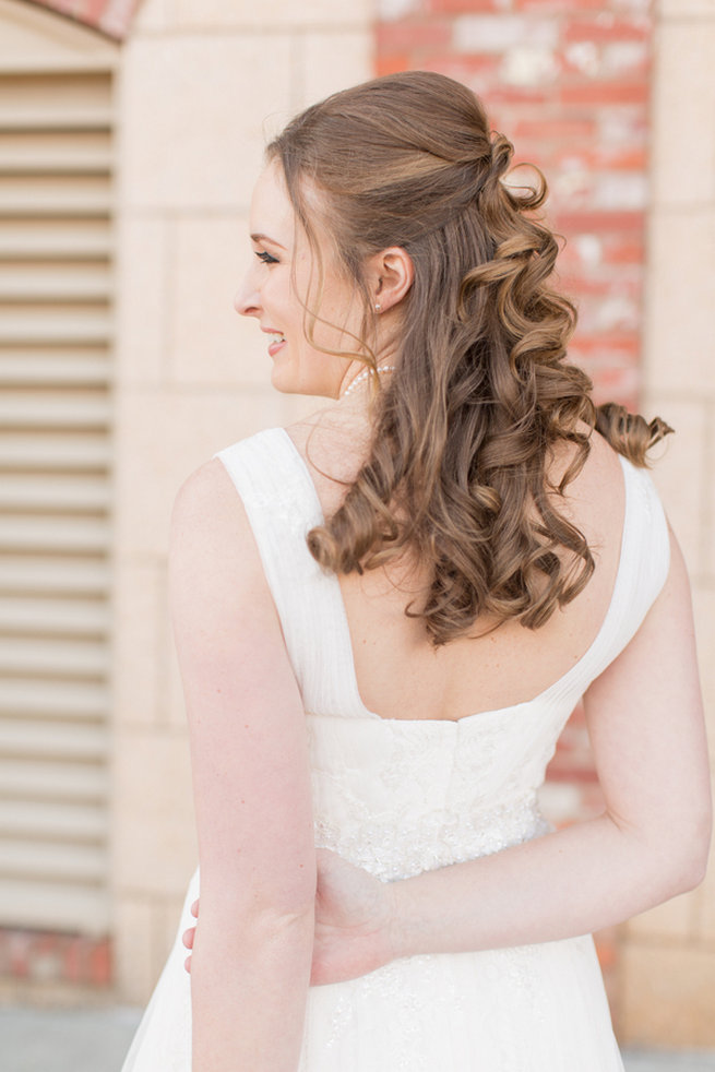 Pretty curls, half up, half down wedding hairstyle. Modern Urban Wedding at Old Cigar Warehouse / Ryan and Alyssa Photography