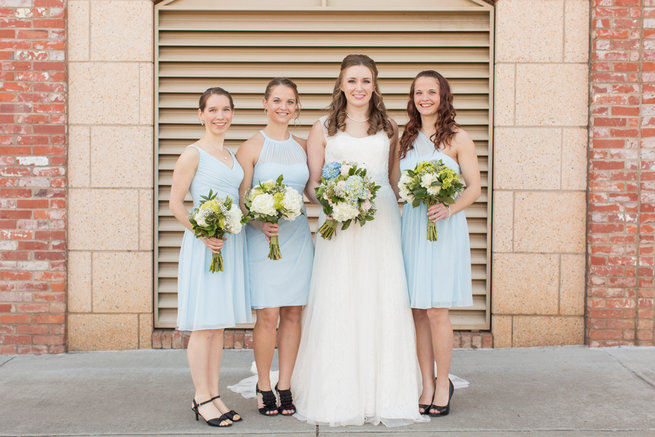 Pale blue short bridesmaids dresses. Modern Urban Wedding at Old Cigar Warehouse / Ryan and Alyssa Photography