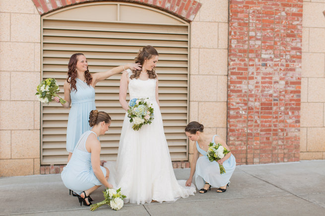 Bride and bridesmaids in pretty pale blue. Modern Urban Wedding at Old Cigar Warehouse / Ryan and Alyssa Photography