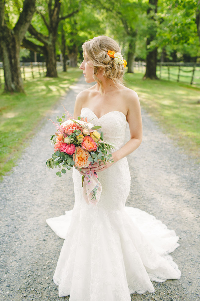 Breathtaking Wedding Bouquet: Peach, yellow and blush bouquet of garden roses, dahlia and farmers greens. Click to blog for more gorgeous bouquet ideas.