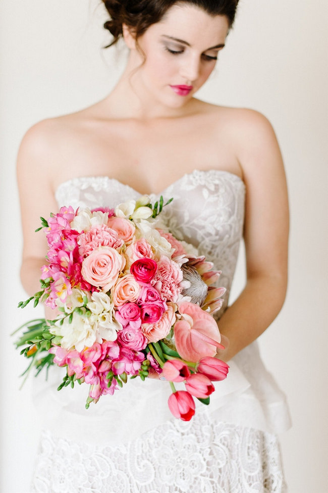 Breathtaking Wedding Bouquet Recipe: Pink Tulips, blush and pink roses, blush Lilly and Protea. Click to blog for more gorgeous bouquet ideas. 