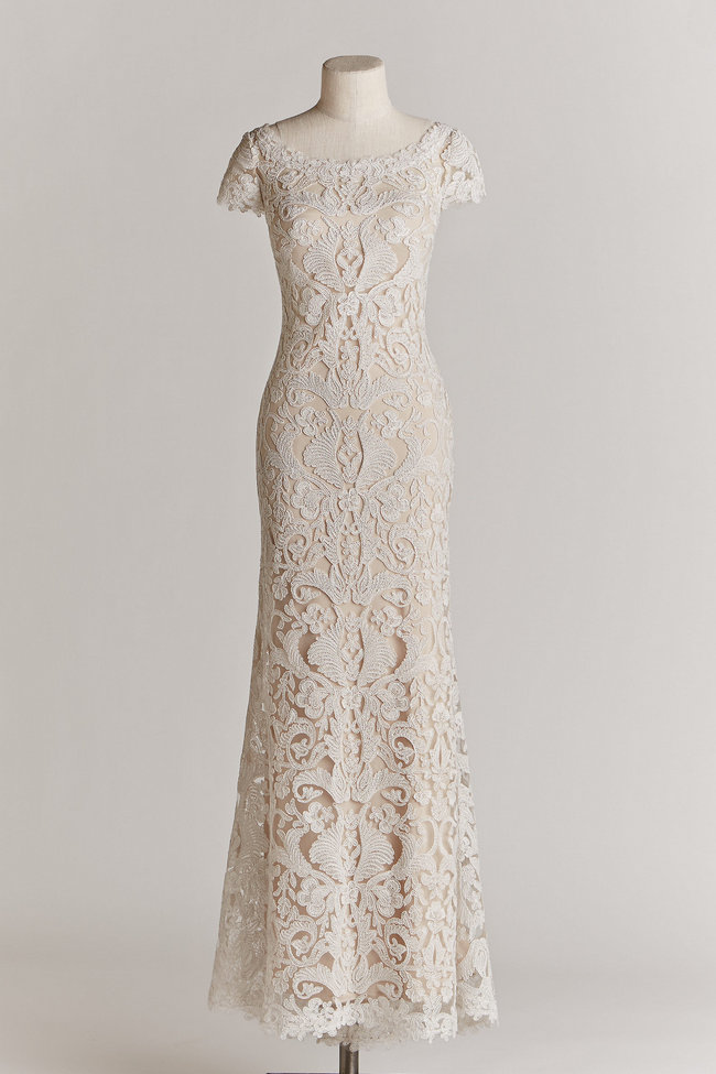 Chic, Sophisticated Wedding Dresses for Romantics: The August gown from designer Tadashi Shoji is made from luxurious fabrics, achieving an impeccably tailored fit. With a wide, scalloped neckline, plunging v back and stunning lace train, this curve-hugging ivory gown exudes classic beauty.