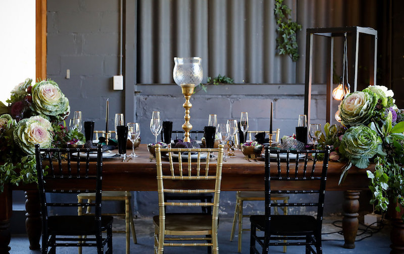 Plum purple black and gold wedding decor