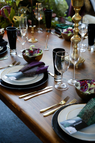 Plum purple black and gold wedding decor