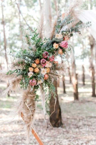 Forest Wedding with Geometric Wedding Arch and pampas grass