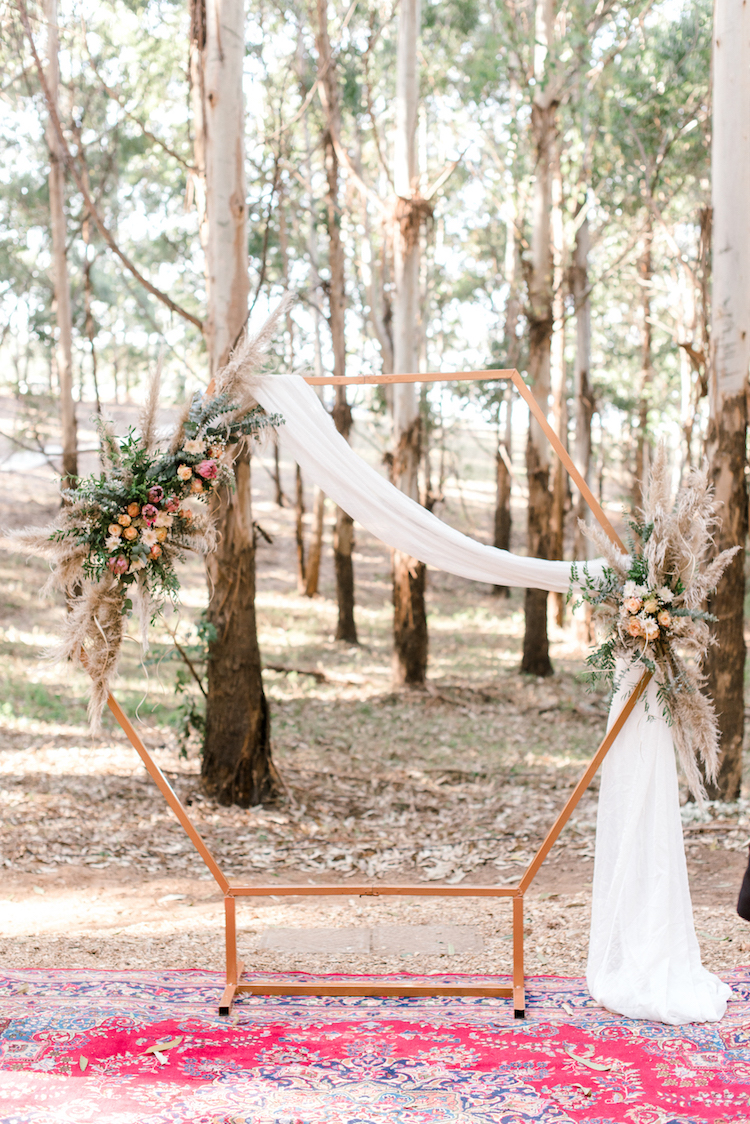 Forest Wedding with Geometric Wedding Arch and pampas grass