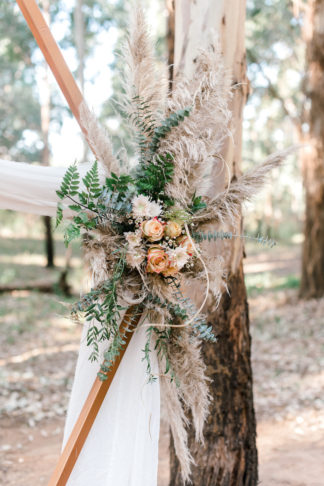 Forest Wedding with Geometric Wedding Arch and pampas grass