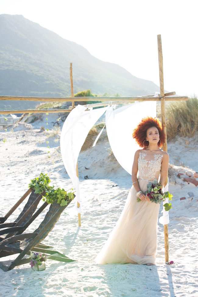 Boho beach wedding ceremony and decor