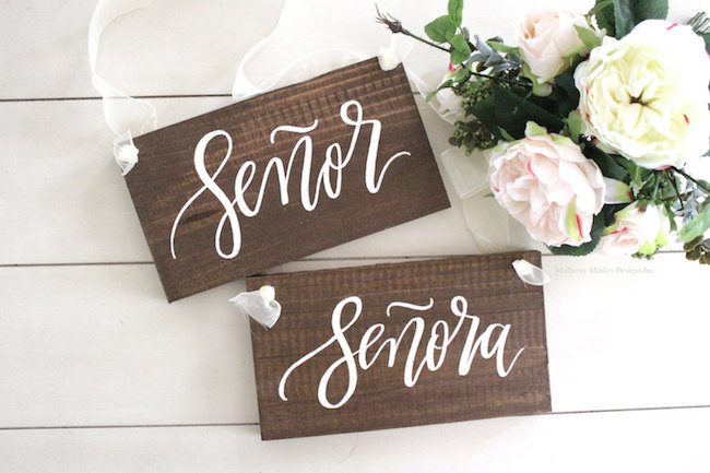 Mr and Mrs Signs chair signs for Bride and Groom in calligraphy. See 20 more cute and creative ideas here: https://confettidaydreams.com/mr-and-mrs-signs/