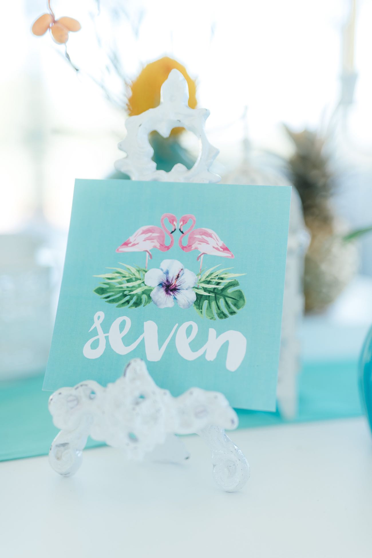 Pink and mint tropical wedding table numbers: flamingos and ferns. Click for the most absolutely gorgeous Tropical Wedding ideas ever!