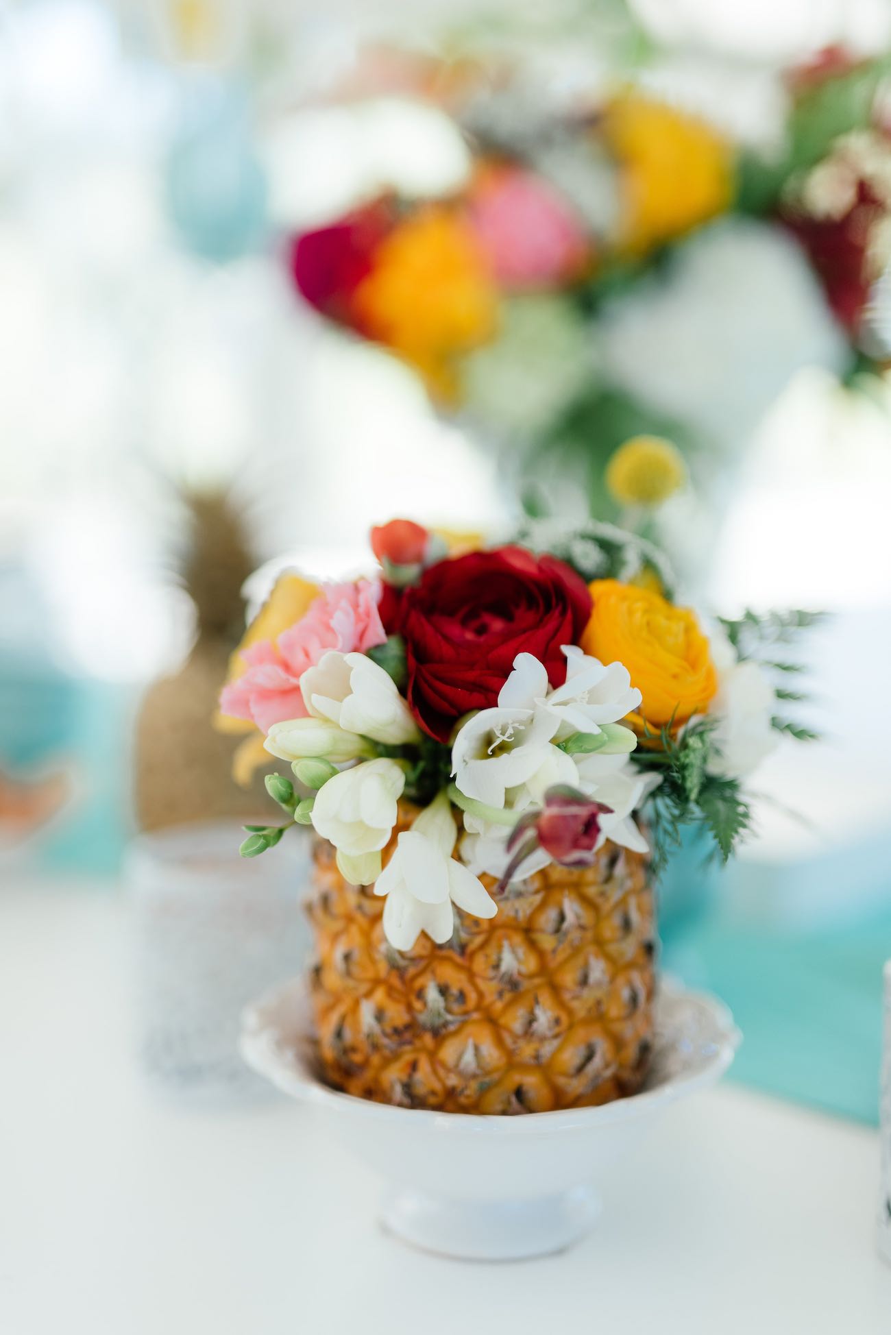 Pineapple wedding flower centerpieces! Click for the most absolutely gorgeous Tropical Wedding ideas ever!